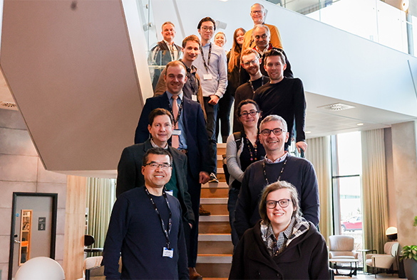 Group of people posing for a photo.