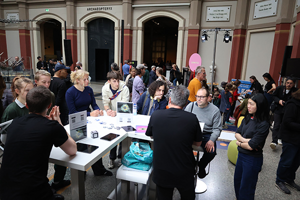 People at a science day in a museum.