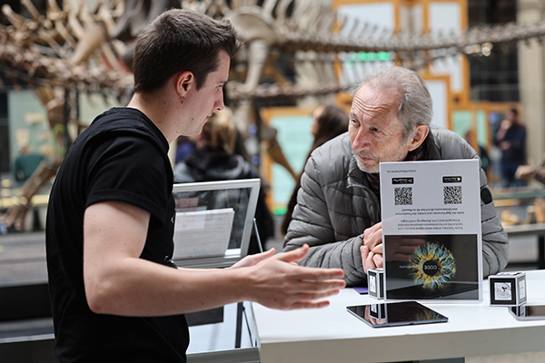 A person explaining something to another person.