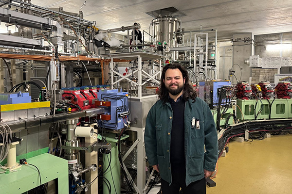 A person posing for a picture in a laboratory.