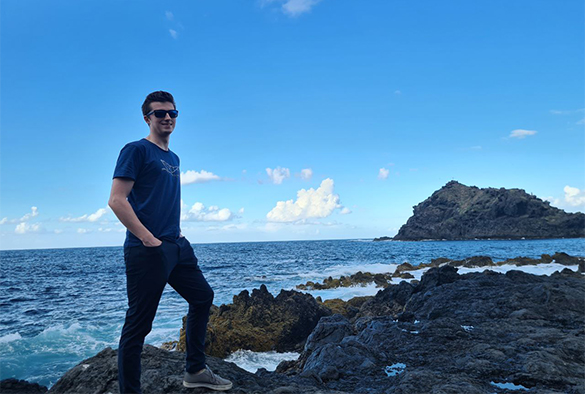 Person on a rocky beach.