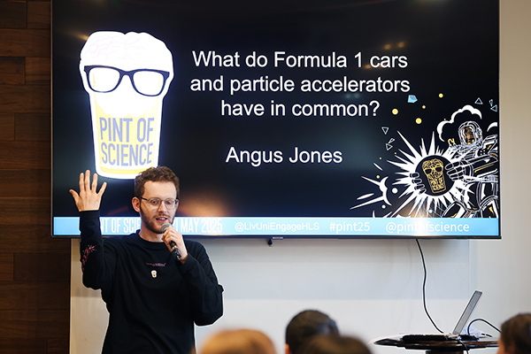 A presenter talking to the audience.
