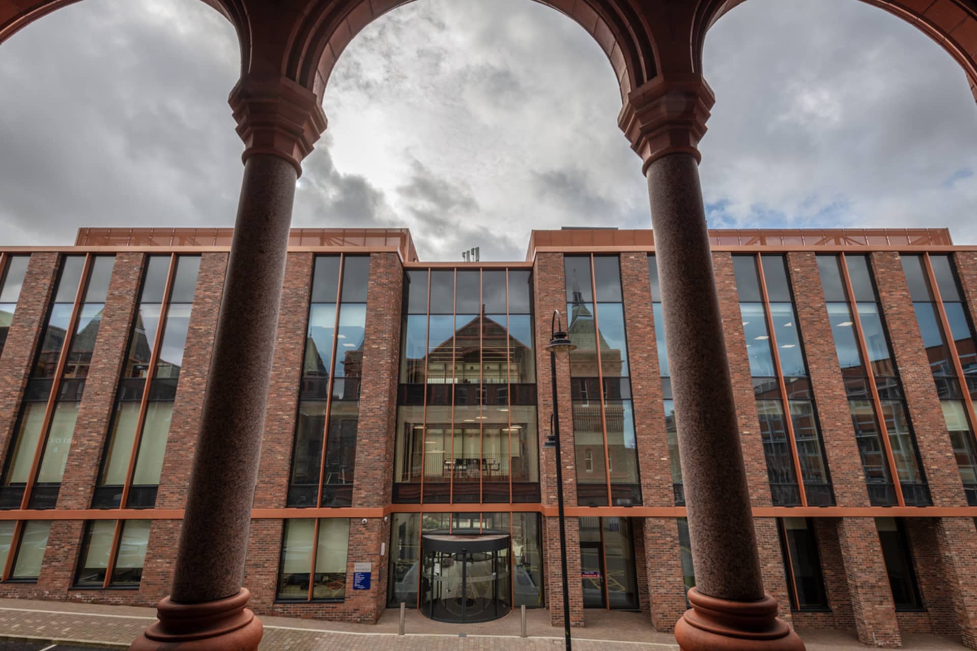 Digital Innovation Factory building shot through the red brick arches