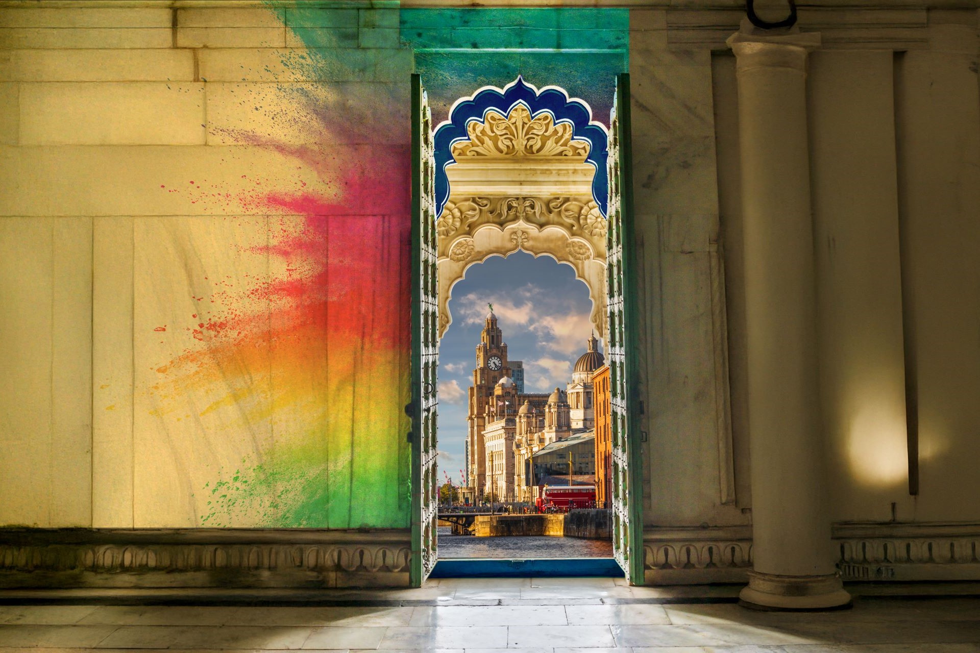 A wall with colourful paint and a door, through which you can see the city of Liverpool.
