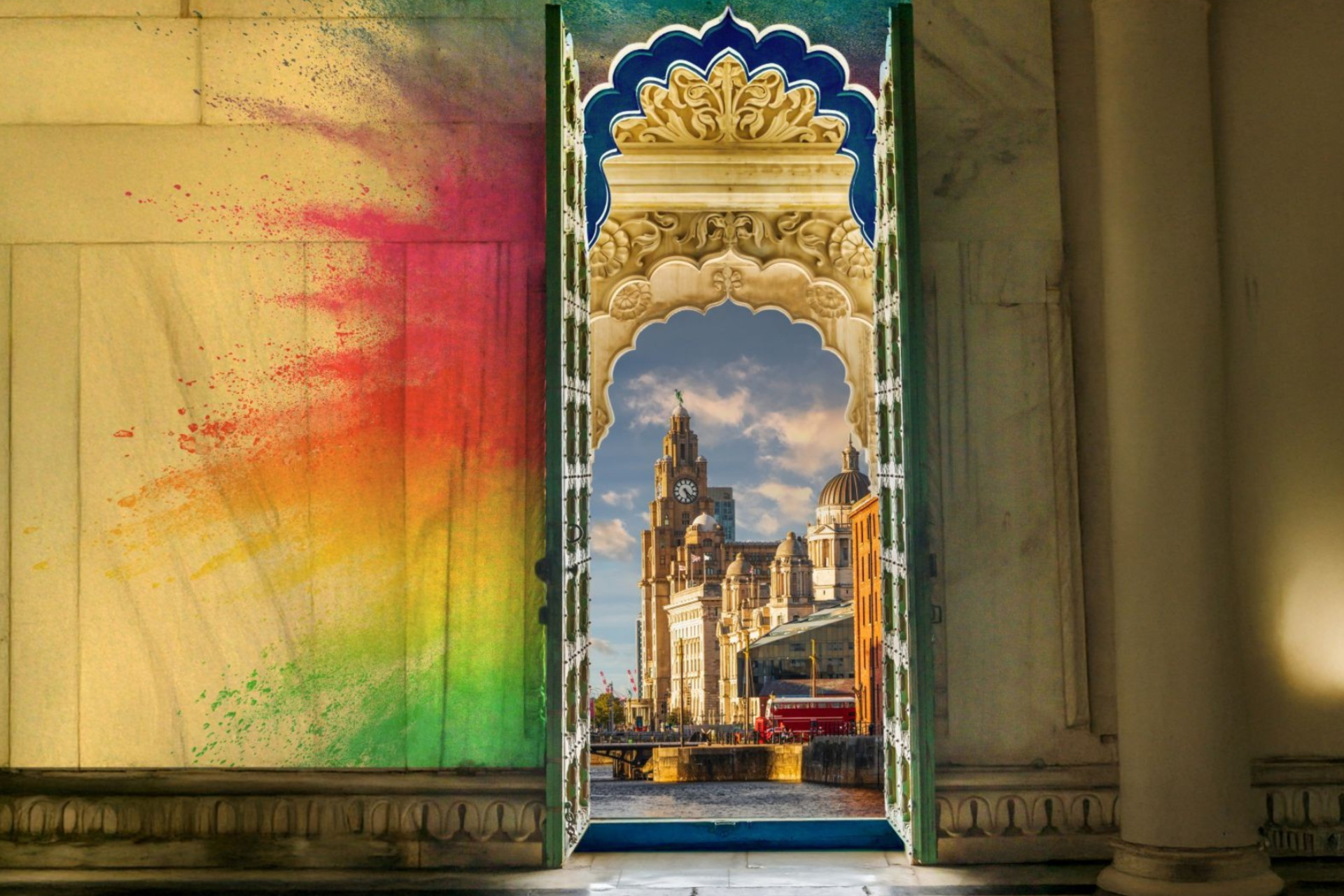 A wall with colourful paint and a door, through which you can see the city of Liverpool.
