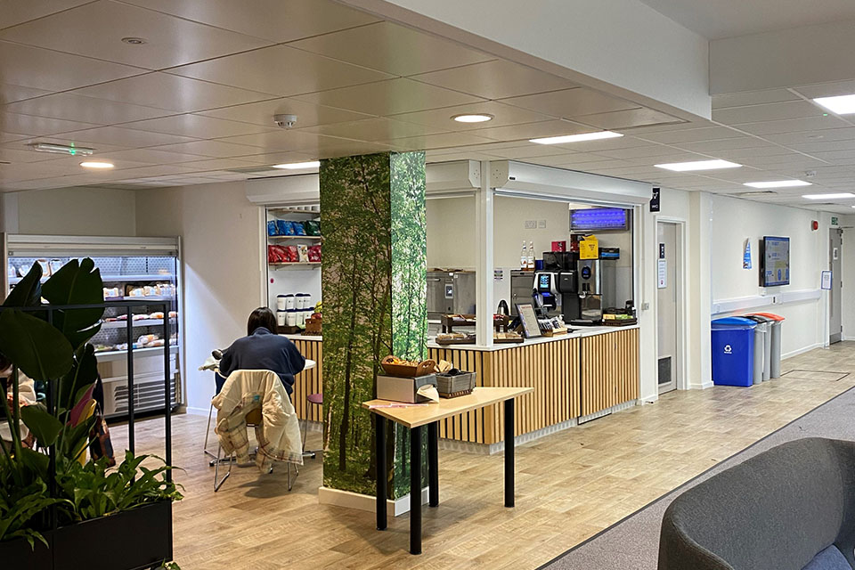 Cafe counter and tables and chairs in the Eleanor Rathbone cafe