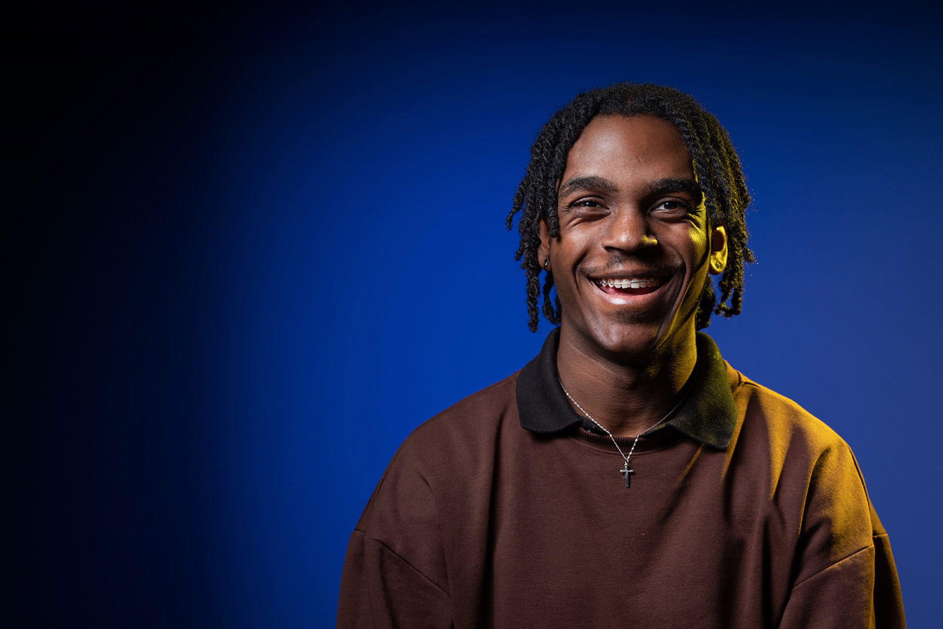 Student looking at the camera and smiling