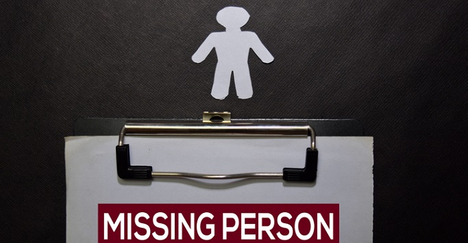 Clipboard with missing person on it