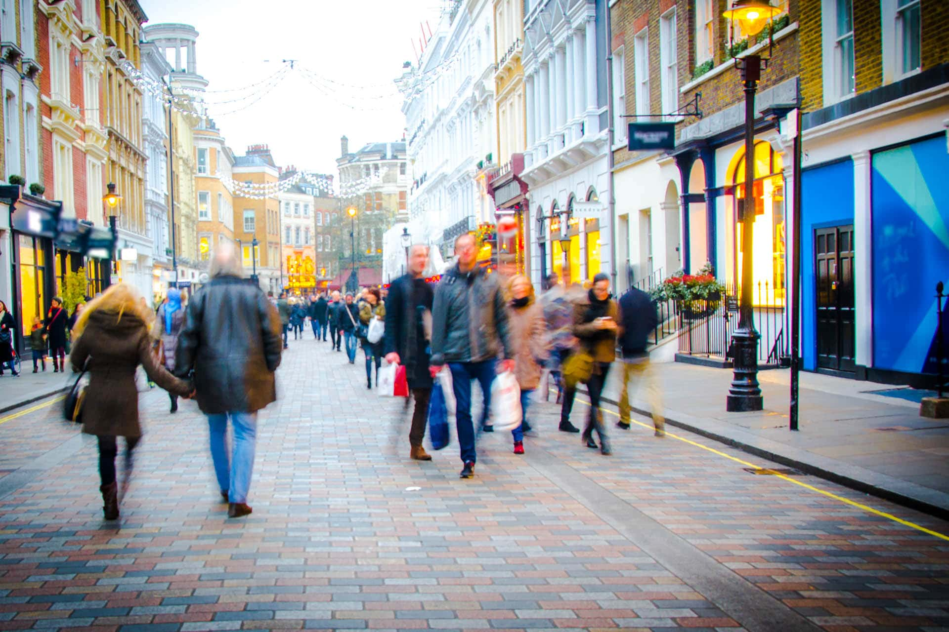 Crowd of people on shopping high street