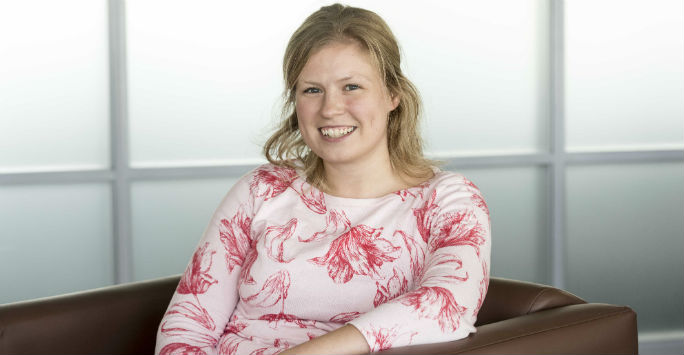 Researcher Nicola Beesley sitting in chair 
