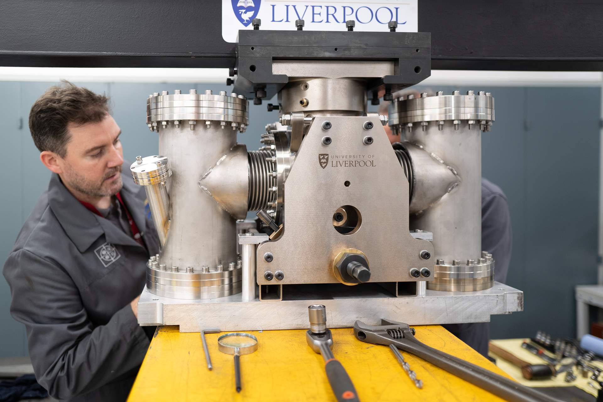 engineer working on pedm experiment detector