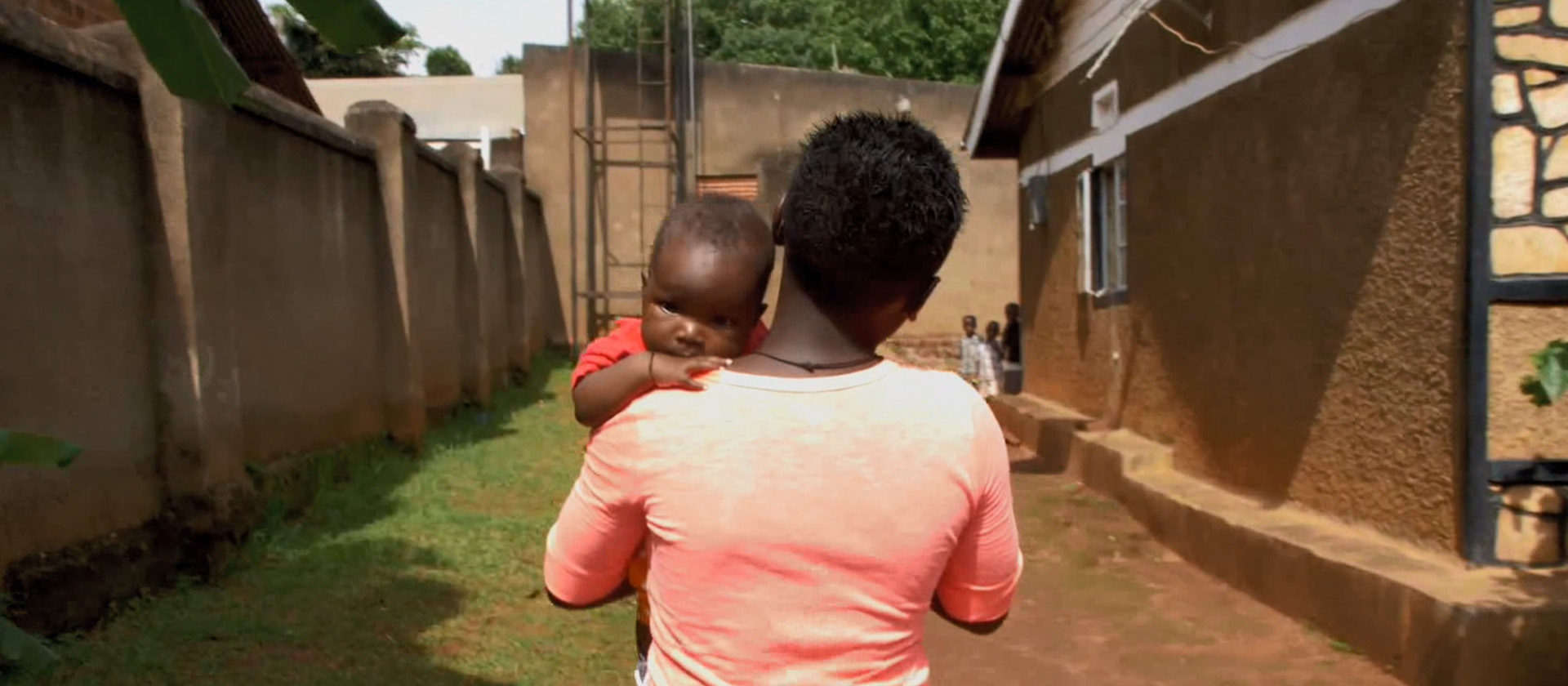 Mother carrying her baby who were involved in the research