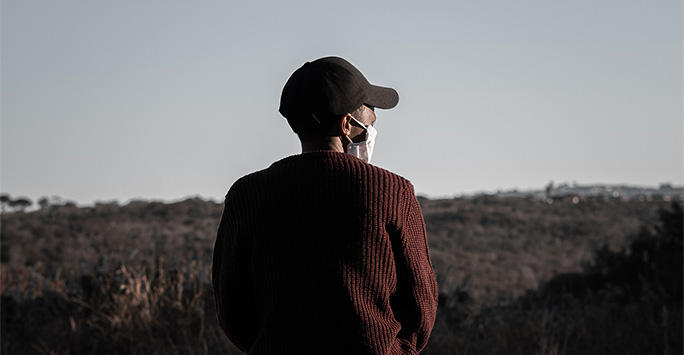 Man looking out across a South African Landscape