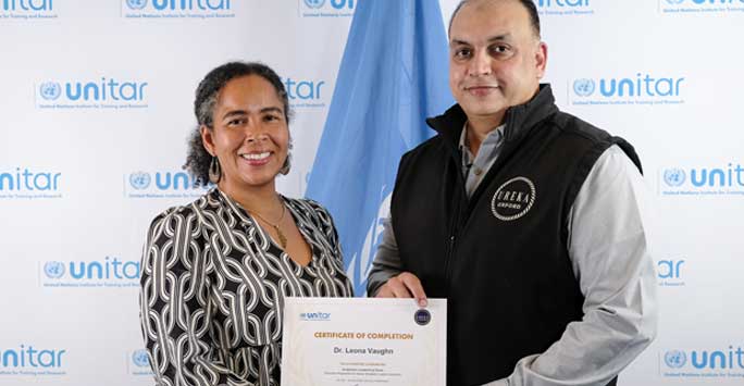 Leona Vaughn receiving her certificate of completion