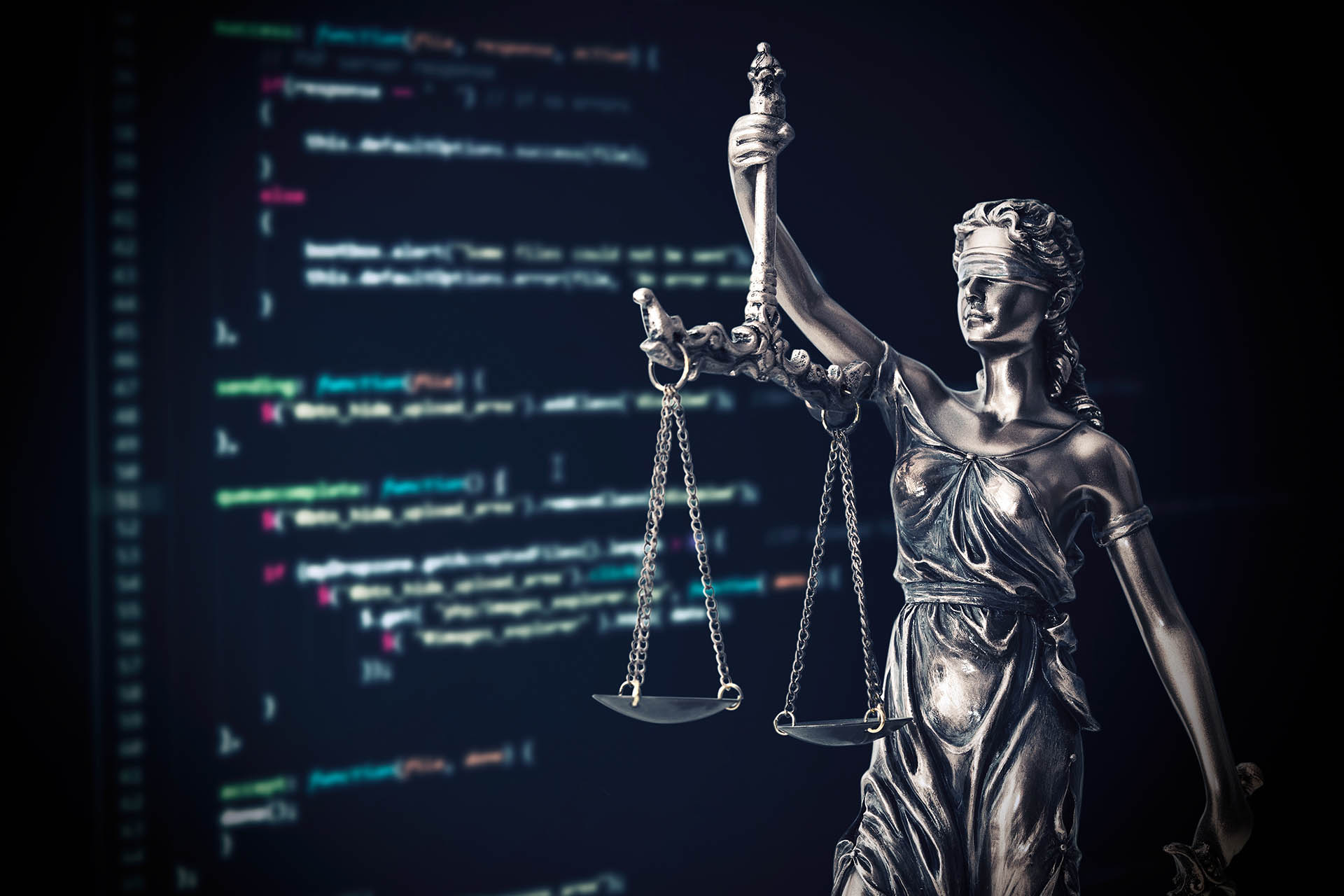 Abstract computer code background with Lady Justice holding scales