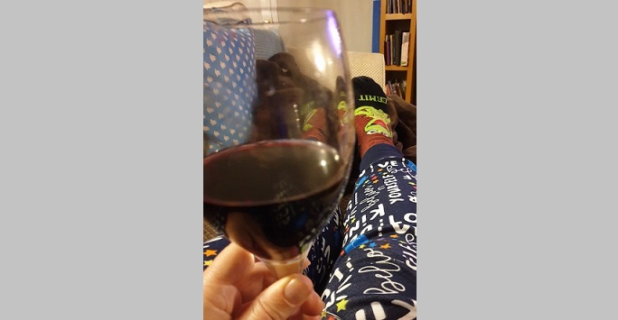 A glass of wine and pyjamas