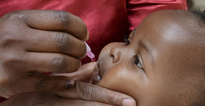 Child receiving the rotavirus vaccine