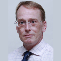Headshot photograph of Angus Kirkland
