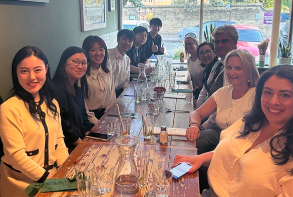 University staff and visitors out at dinner