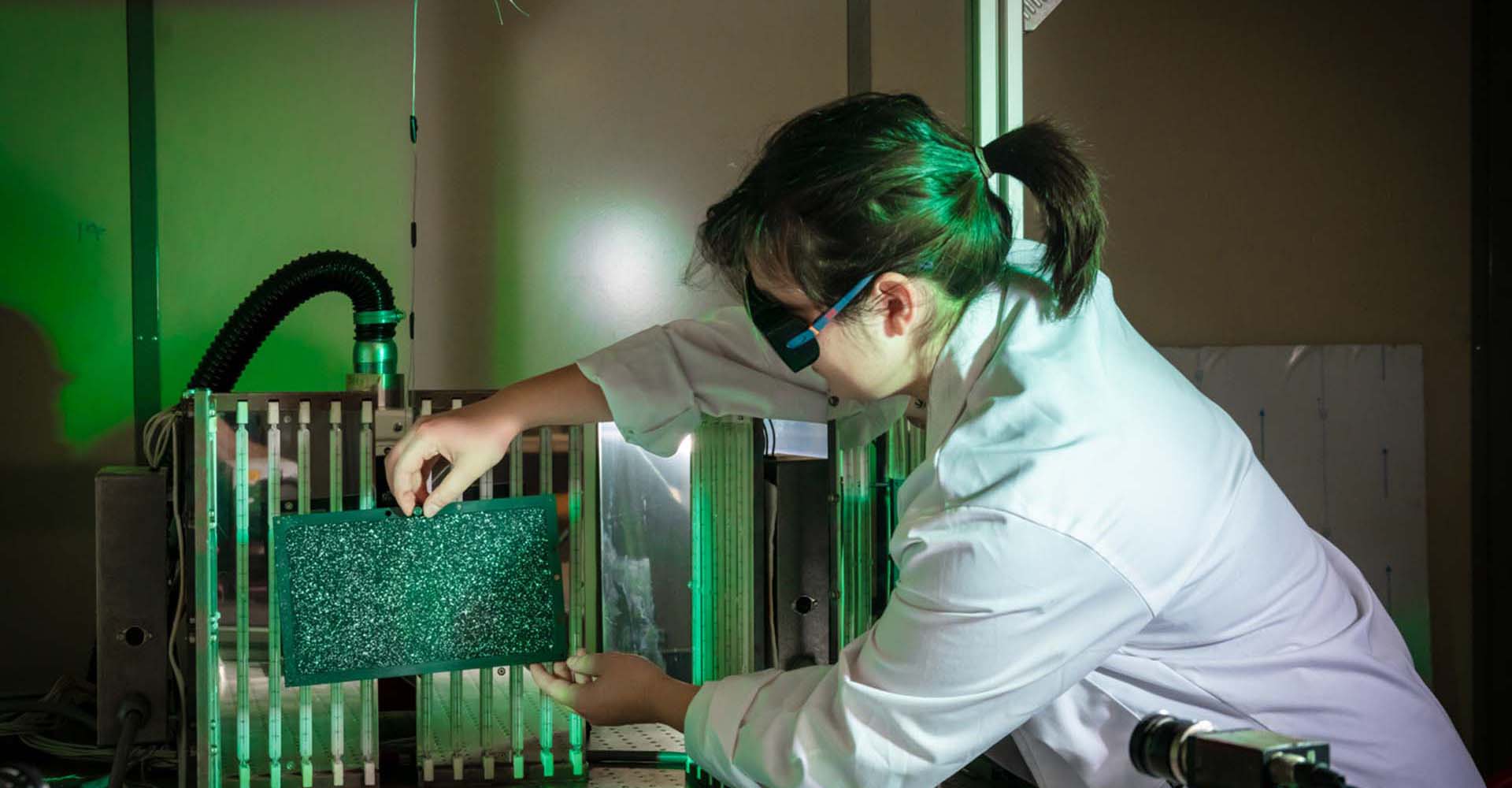 Structural engineer using enhanced virtual engineering equipment in lab