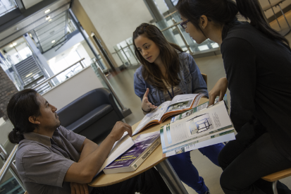 Students chatting about their work. July 2012