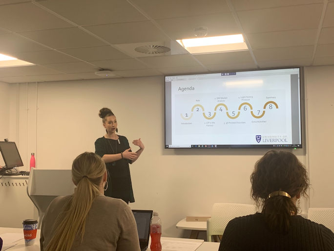 Charlotte delivering her talk