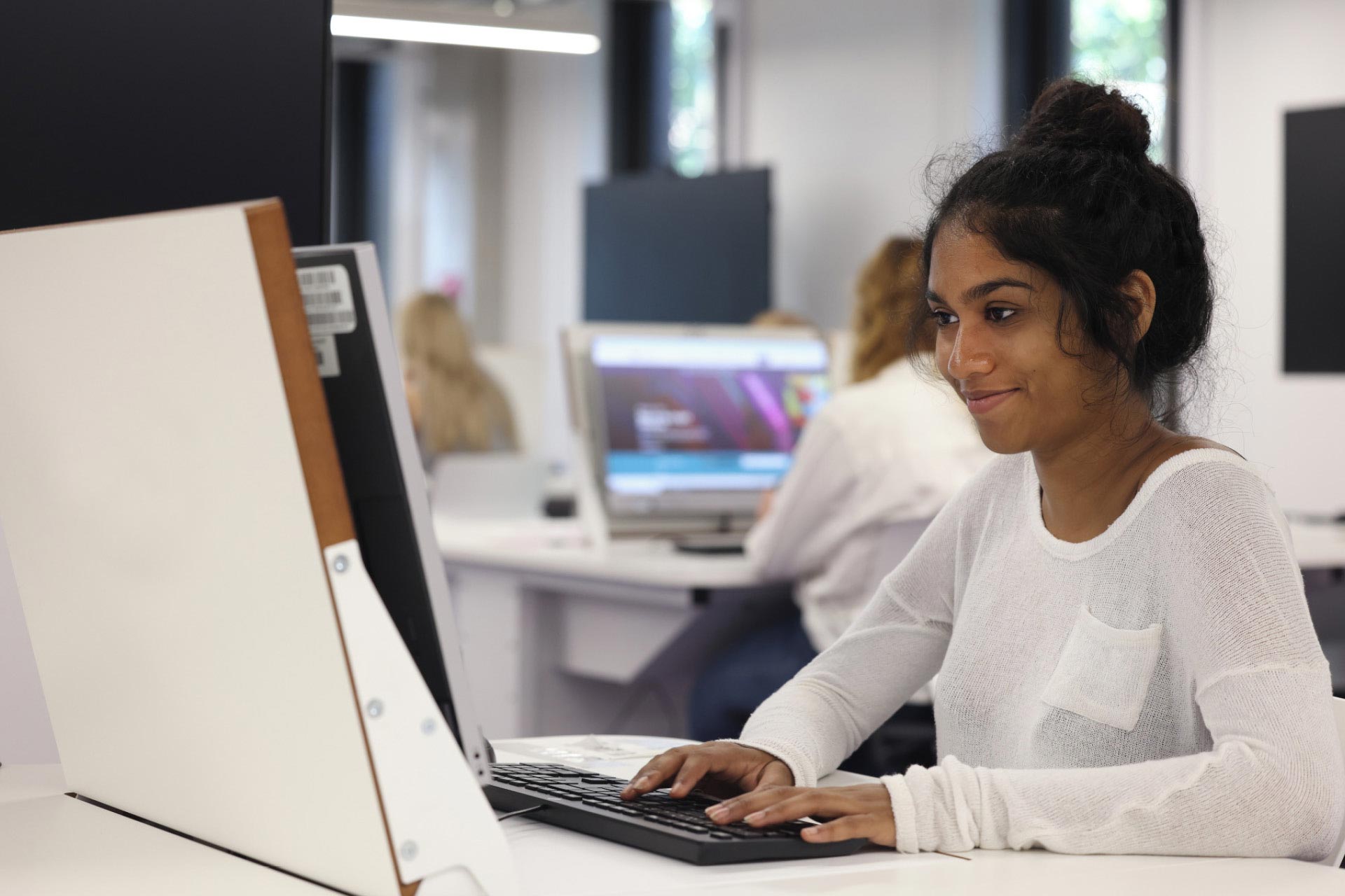 Undergraduate student working on computer