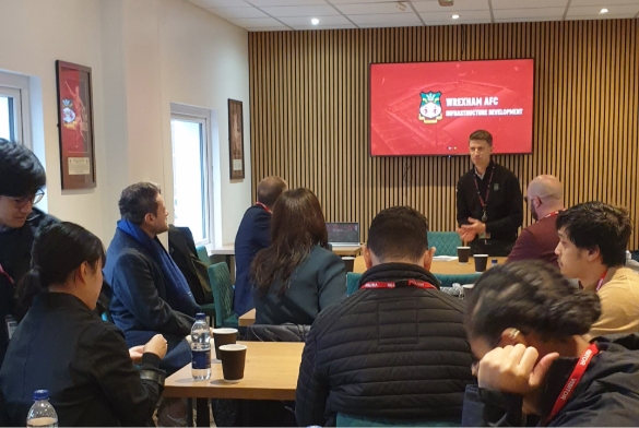 FIMBA students attending a talk at Wrexham FC