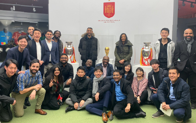 FIMBA cohort and academics at Real Federación Española de Fútbol museum with trophies