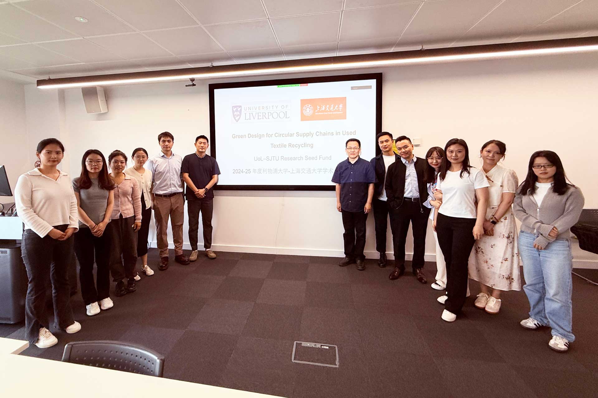 Students and academics pose after a research workshop organised by the University of Liverpool Management School's Operations and Supply Chain Management Group, with guest speakers from Shanghai Jiao Tong University. This is part of a research collaboration for the project  “Green Design for Circular Supply Chains in Used Textile Recycling supported by the Uol-SJTU Research Seed Fund.