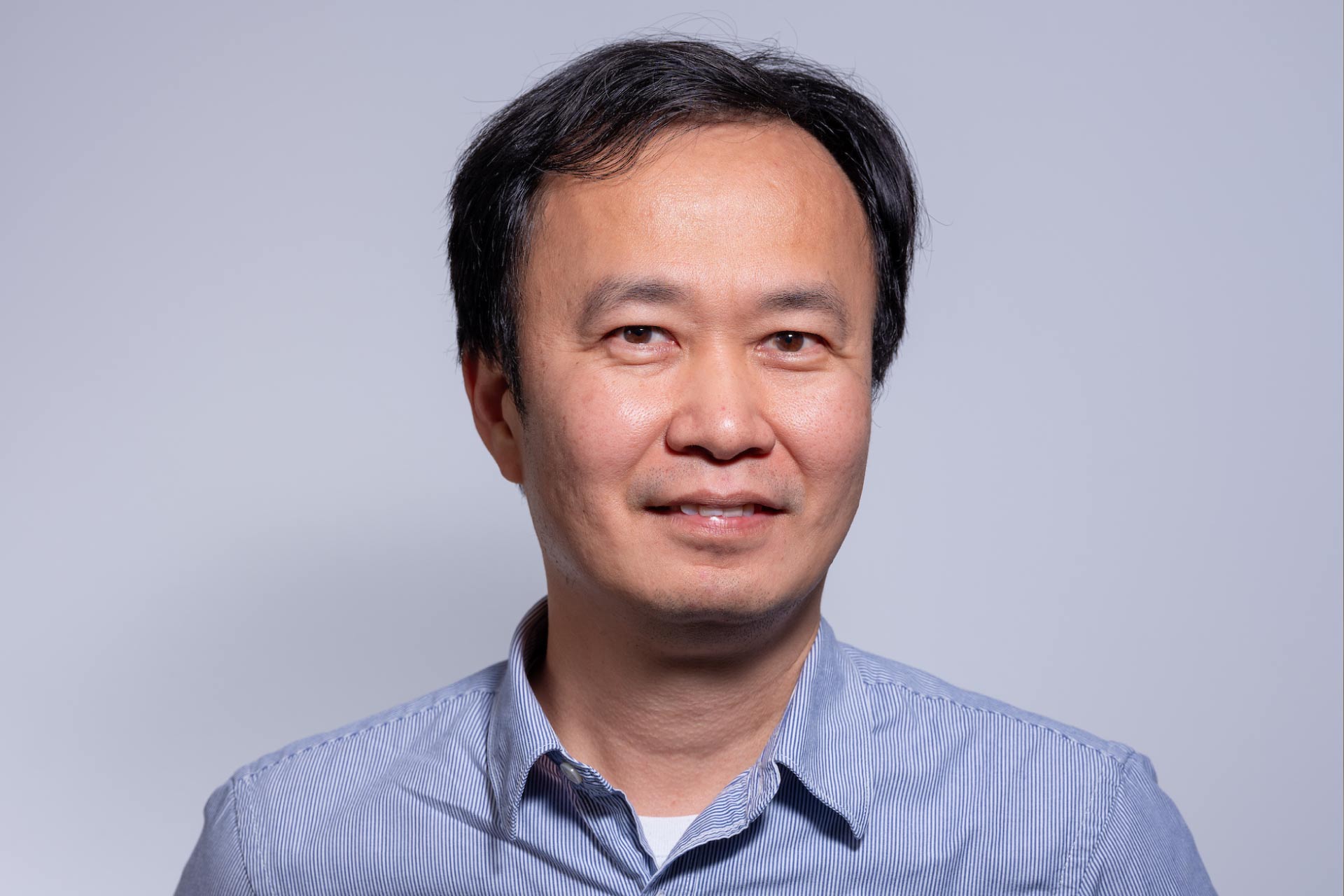 Headshot of Yung Chiang
