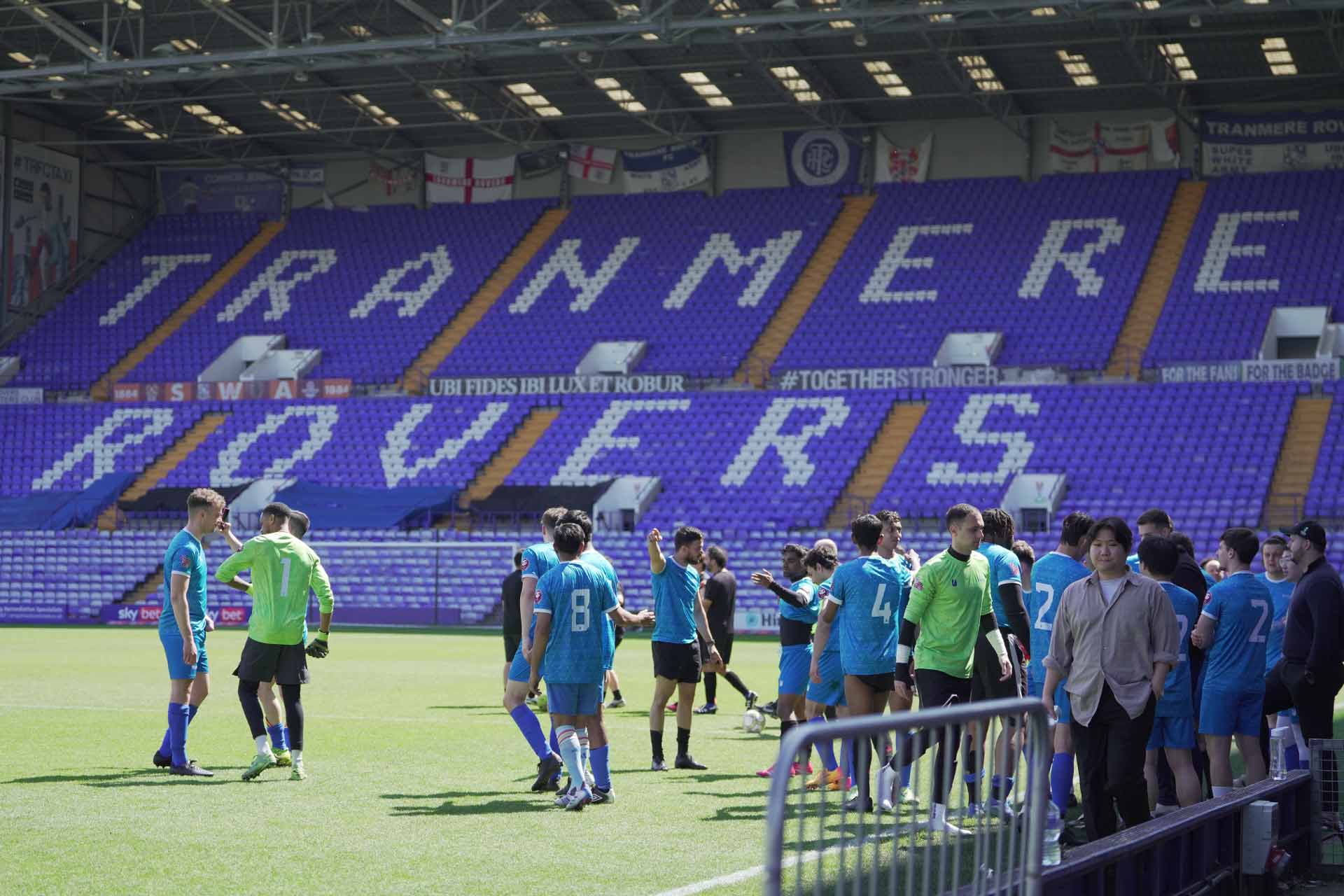 Enhancement Week 2025 - FIMBA and Sports Business and Management MSc football match. Image of students at Tranmere Rovers ground.
