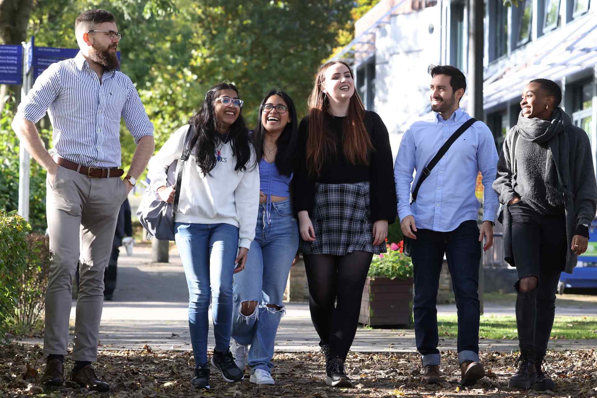 Group of students having a walk around campus