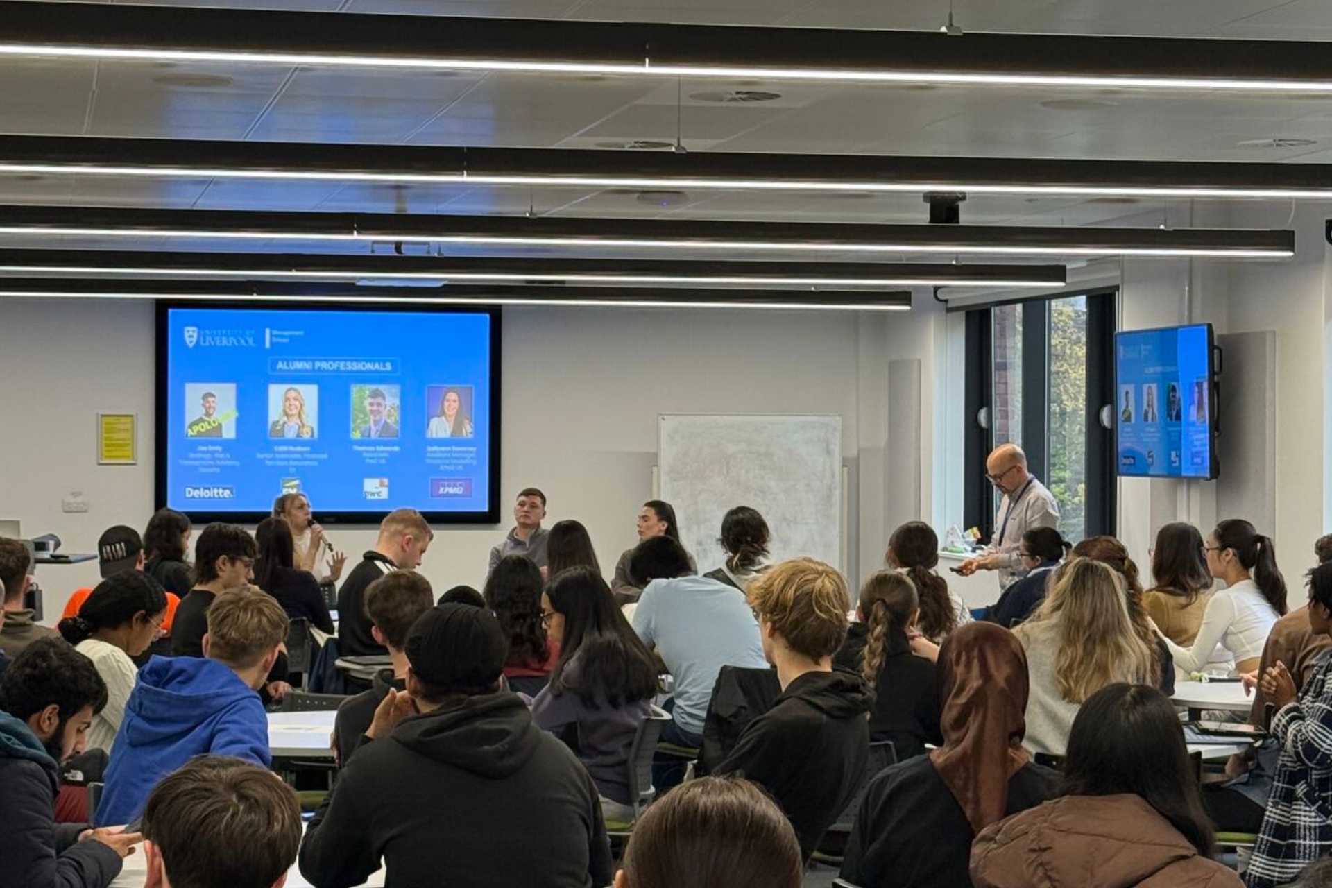 A room full of undergraduate students attending the Big 4 Bootcamp with alumni panel