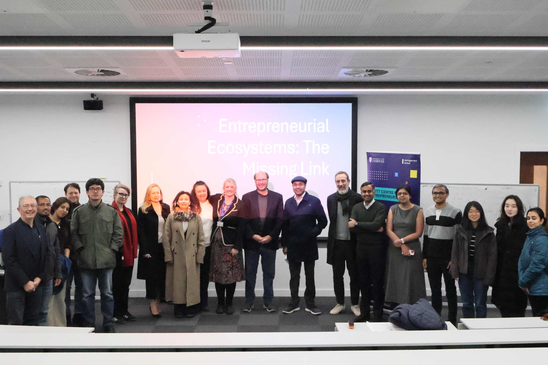 Professor David Audretsch standing with attendees