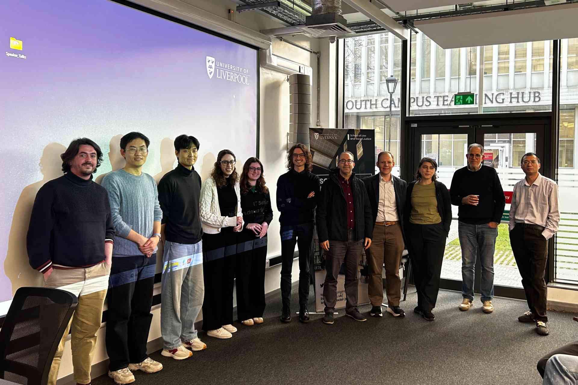 The 10 speakers plus LAMBDA Director Professor Taamouti standing together