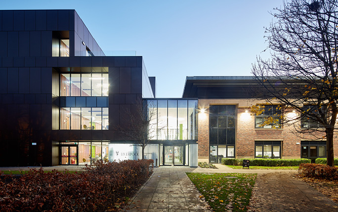 The Management School building lit up