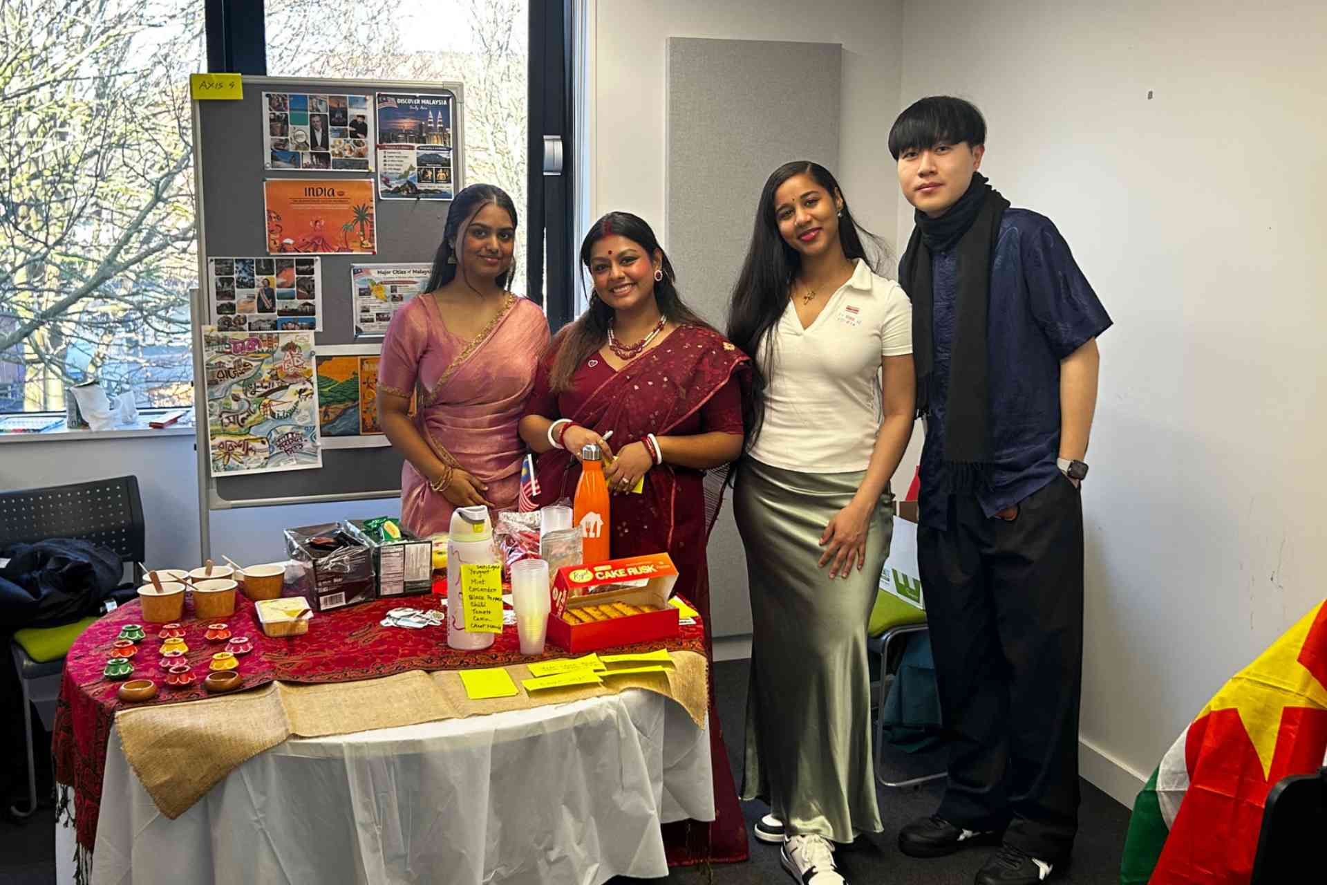 A group picture master's students, Axis4, participating at the Heritage and Culture Showcase event