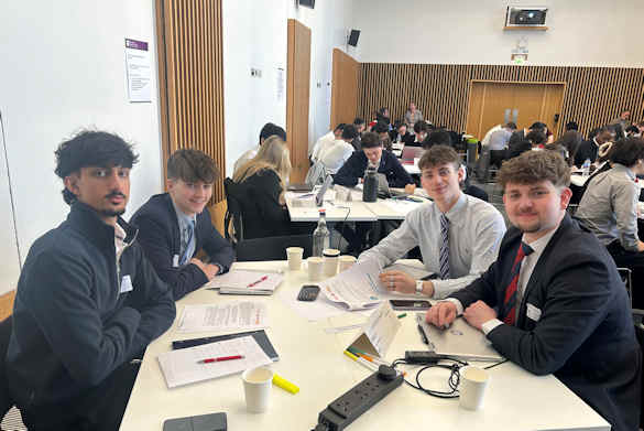 Team of students pictured at a business challenge competition