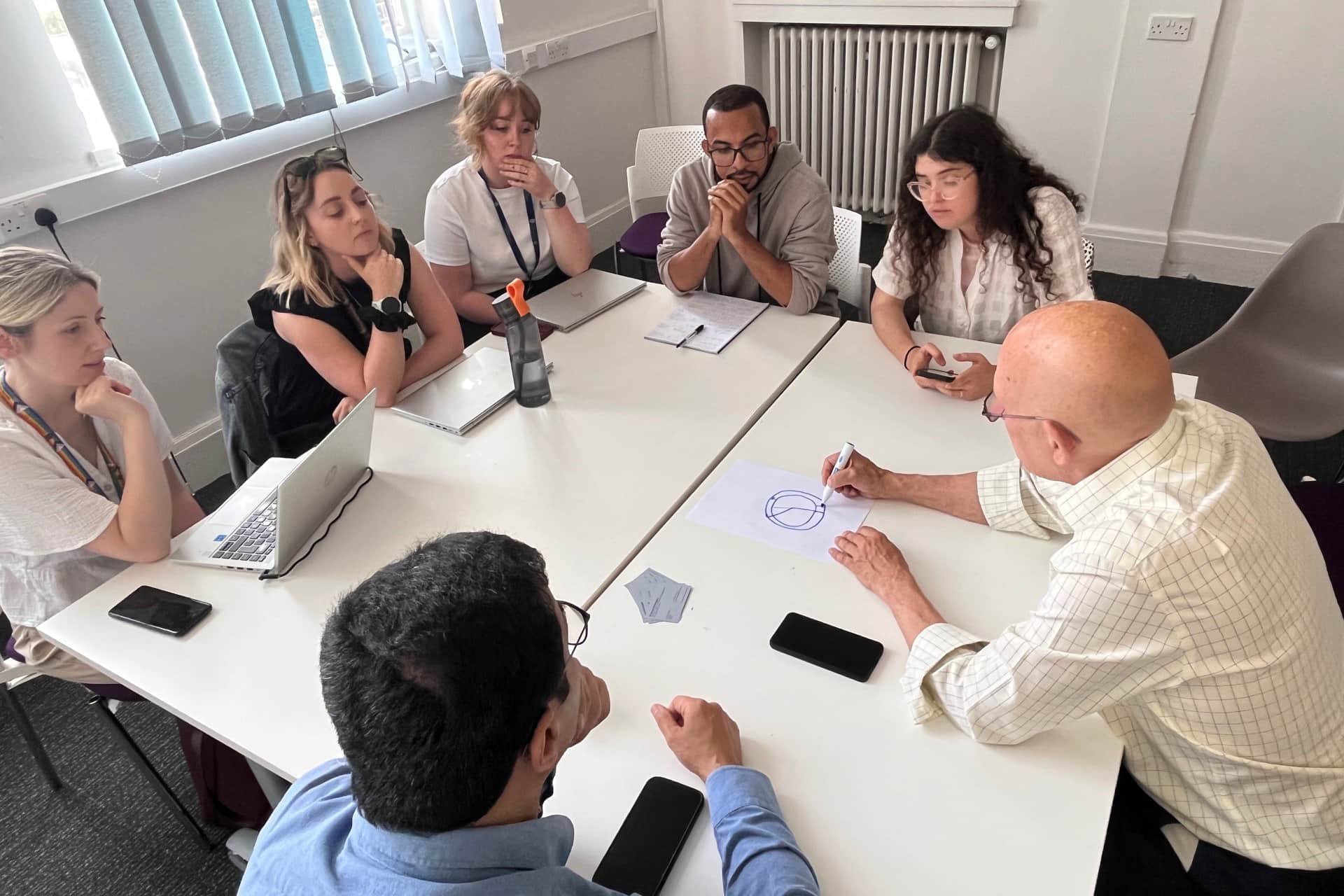 Dr Bruce Pinnington leading a roundtable discussion