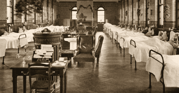 black and white photo of hospital ward