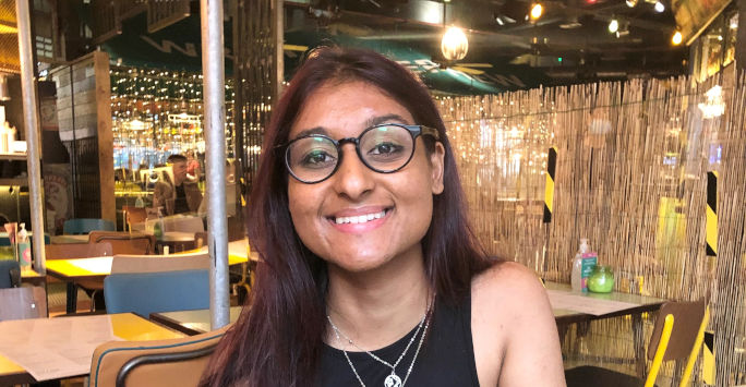 Image of student doctor Pooja Patel in a restaurant