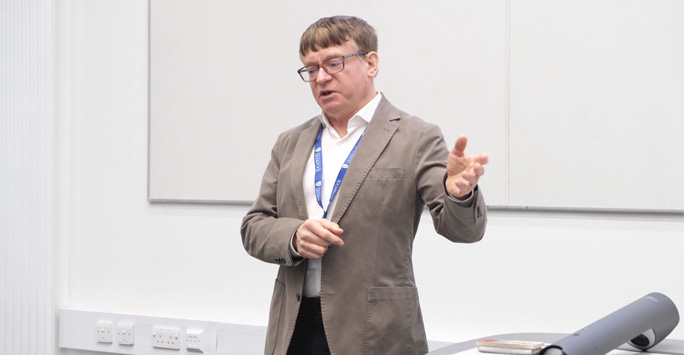 Dr. Colin Michie, a clinical academic and Consultant Paediatrician delivering a lecture