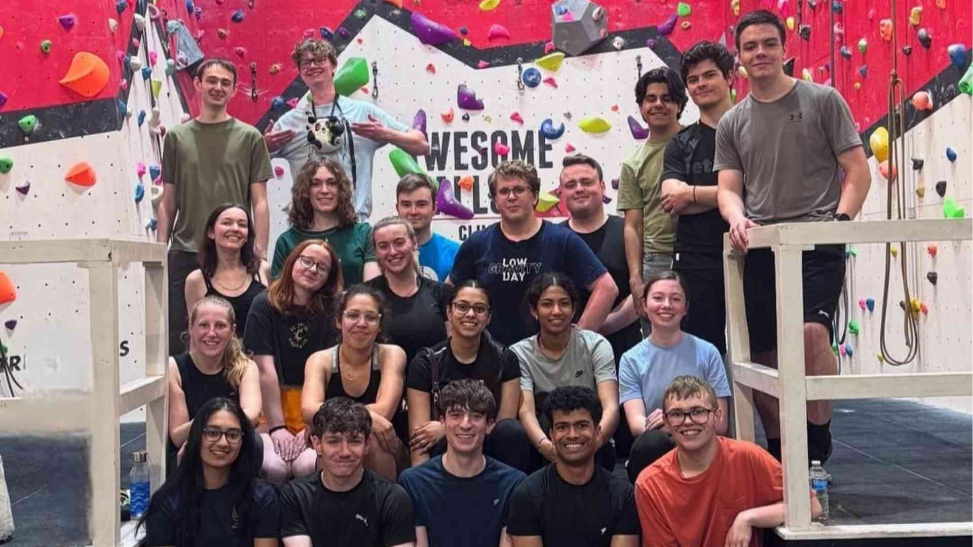 Group photo of LMSS students smiling together at Awesome Walls climbing centre.