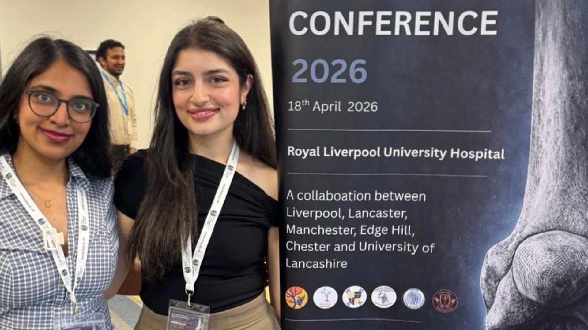 Photo of 2 student doctors at the NW Trauma and Orthopaedics Conference