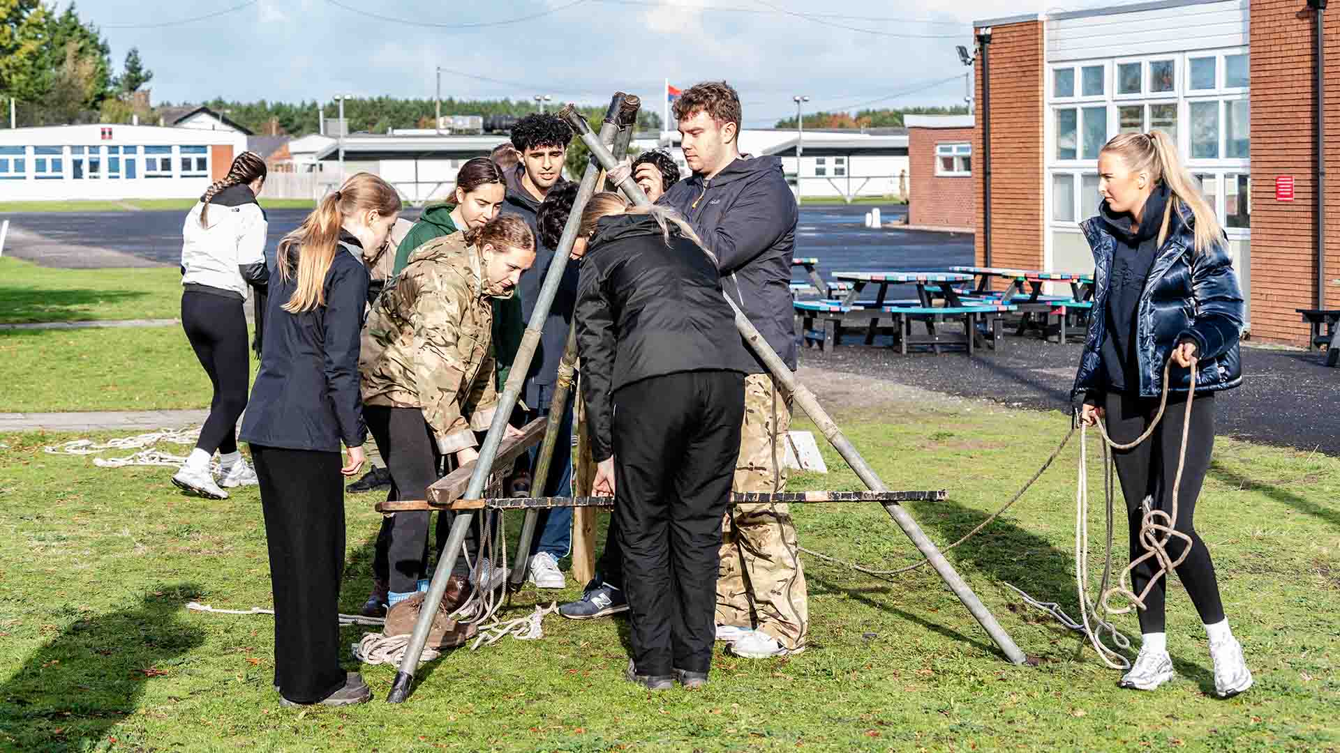 Students perform a construction activity at Altcar