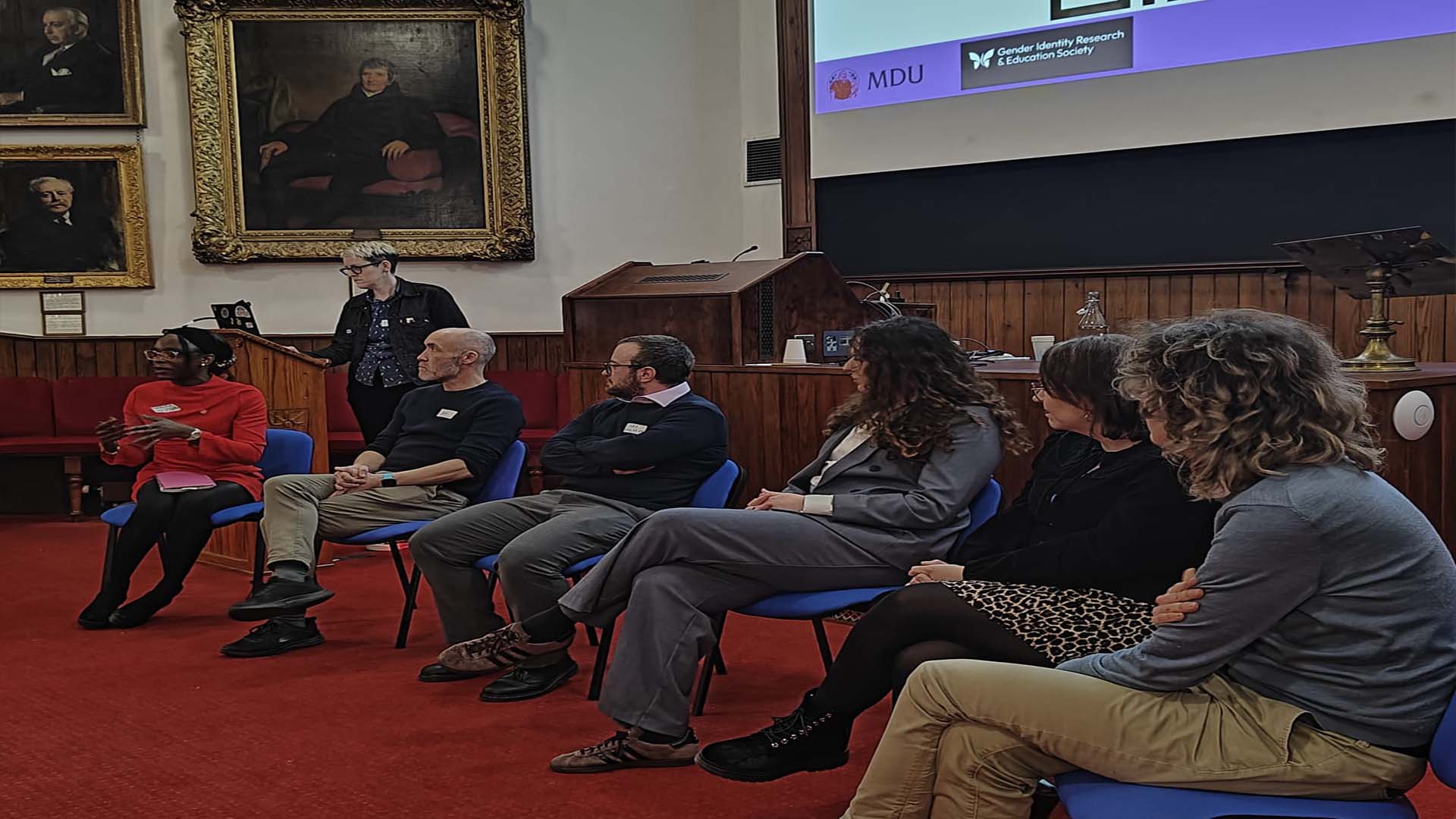 a panel takes questions at the transgender healthcare conference