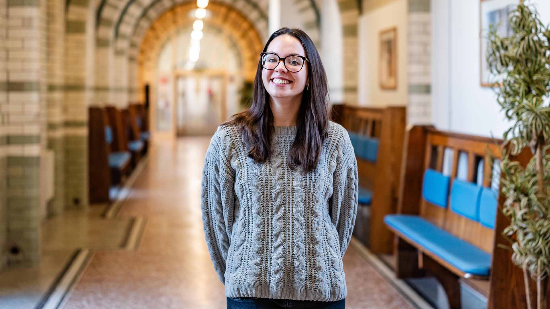 Maisie along the corridor of the Waterhouse building