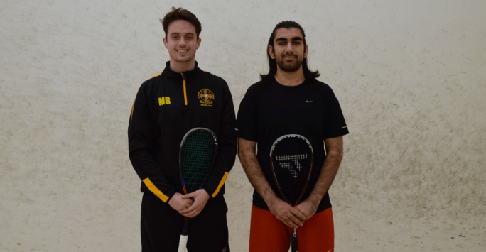 two squash players on court