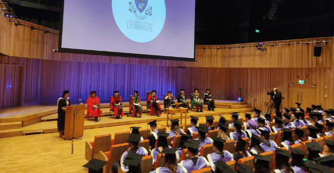 graduate addresses the audience